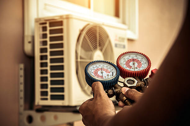 Professional Ac Installation technician working in Russellville, AR
